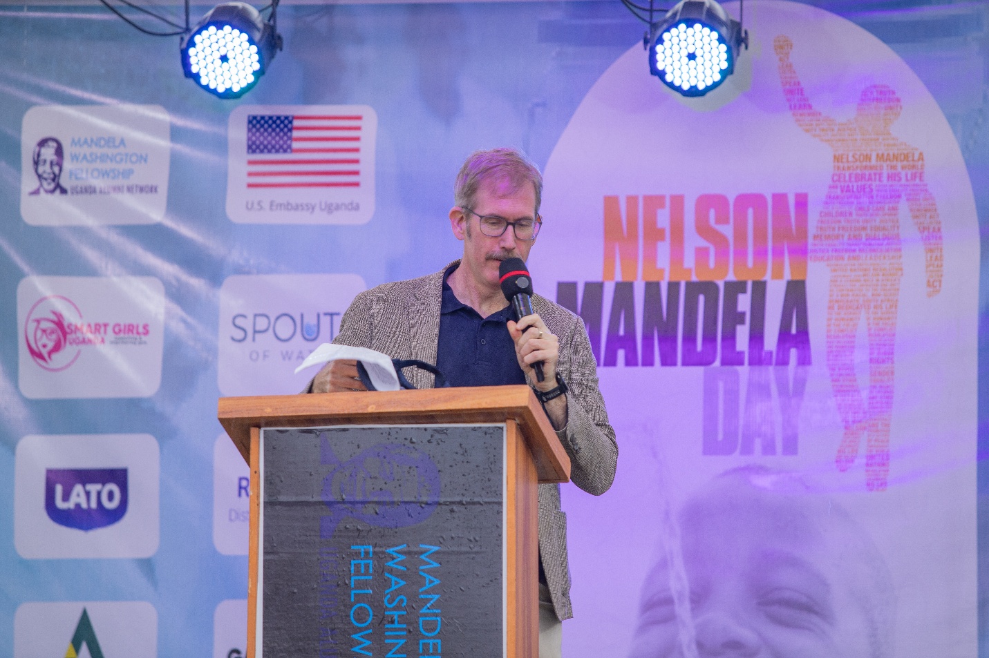 Mr. Kevan Higgins, Deputy Chief of Mission at the U.S. Embassy in Uganda, addressing participants.